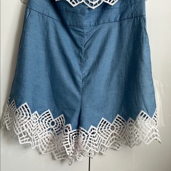 REVOLVE BARDOT Runaway Romper in Sky Blue Chambray with embroidered detail. - Picture 4 of 13